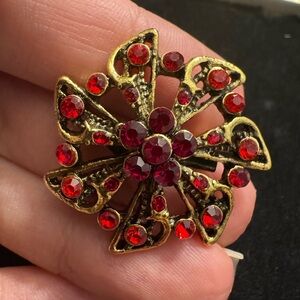 Elegant Gold and Red Brooch
